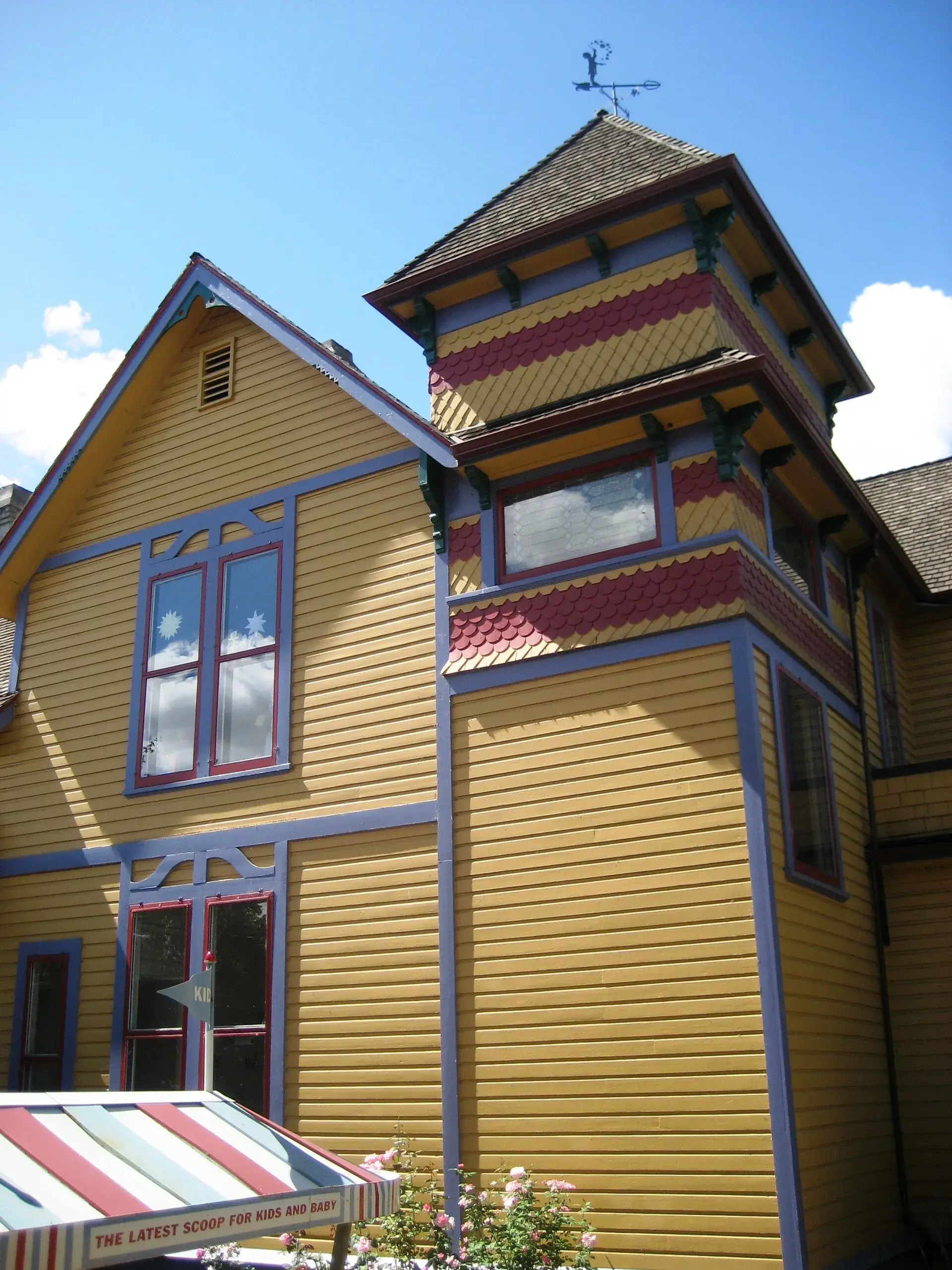 The Gilbert House, a yellow Victorian with decorative trim in Salem, Oregon